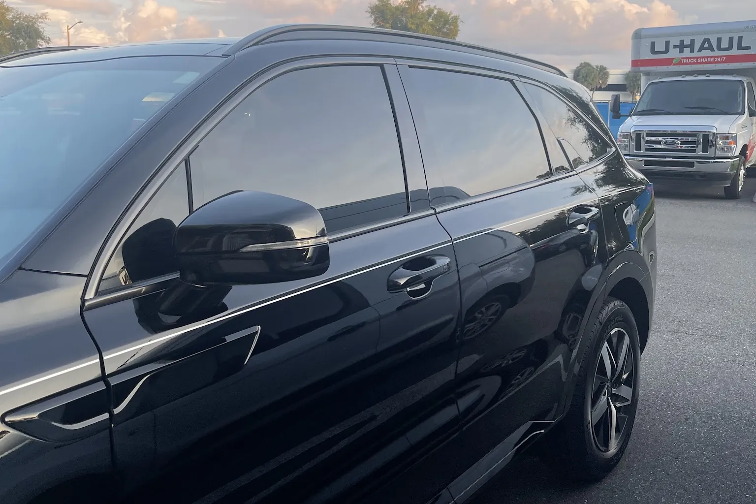 Side windows of a black SUV after tinting